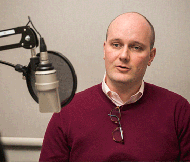 Stuart Andreason recording podcast for Economy Matters